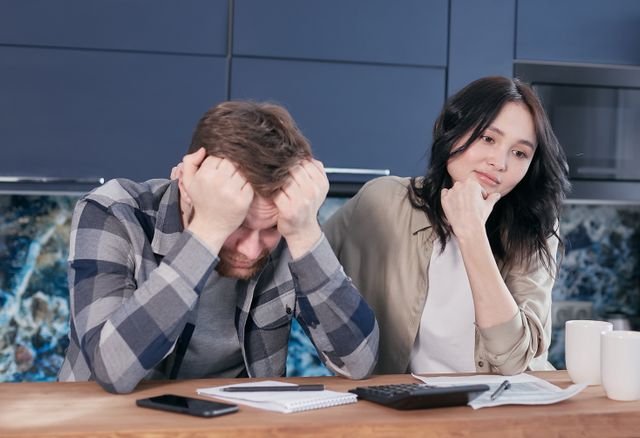 Person creating a debt repayment plan on a low income